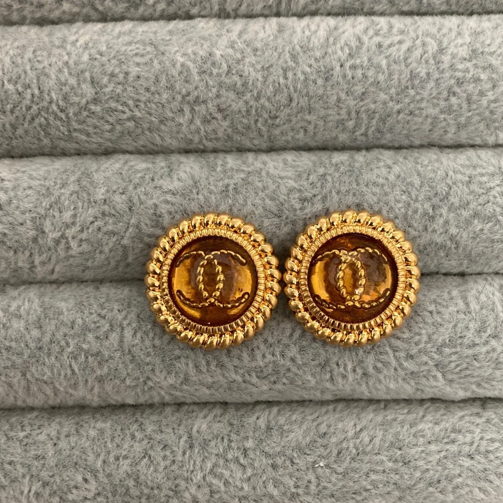 CHANEL Gold and Brown Round Earrings